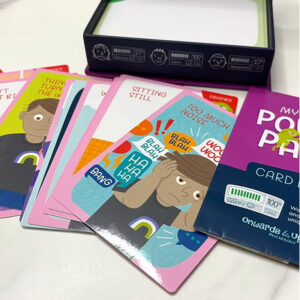 A box of cards featuring an image of a person on the front, showcasing a colorful design and clear text.